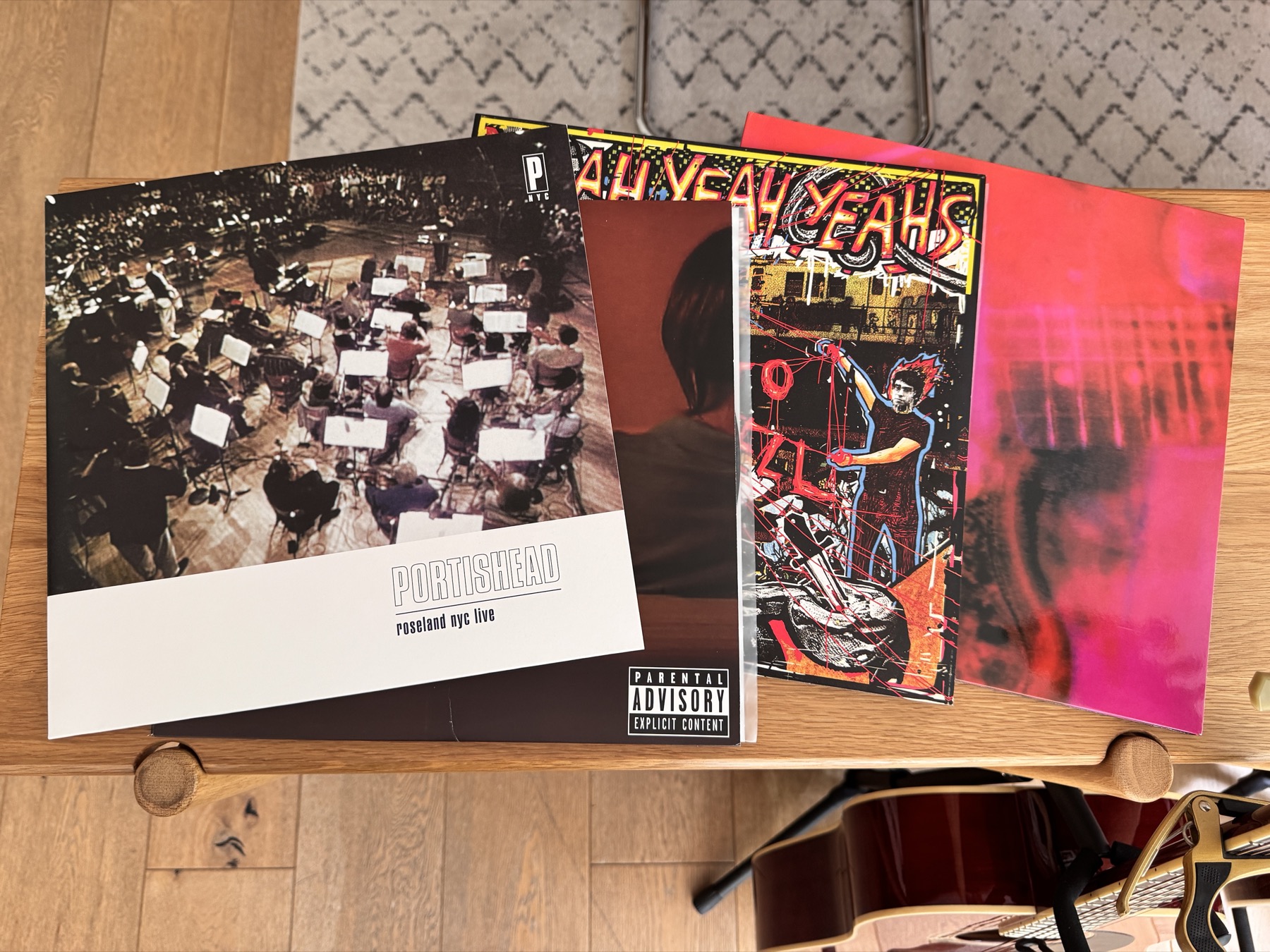 4 vinyl records on bench